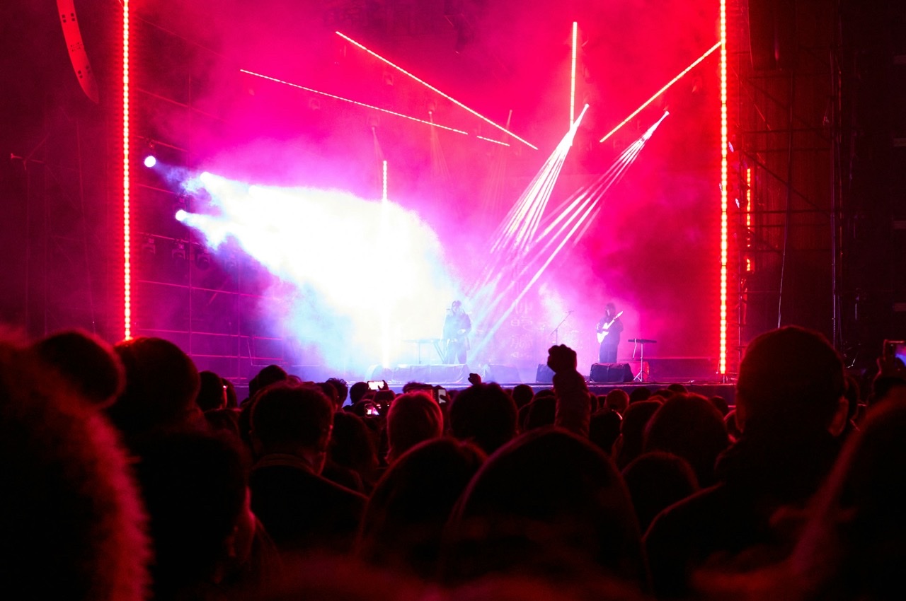 Festival attendees uploading photos via QR code